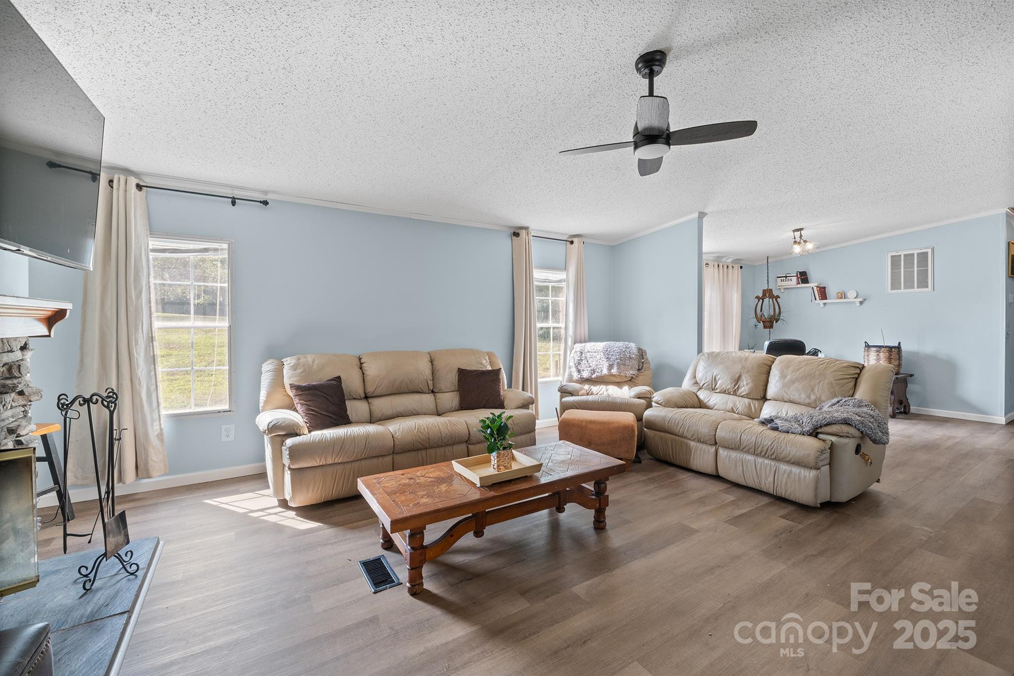 10483 Troutman Road Midland, NC 28107 - Photo 6 of 21 a living room with furniture a rug and a window