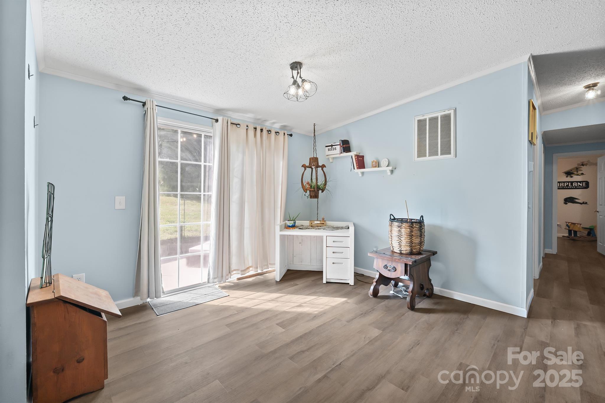 10483 Troutman Road Midland, NC 28107 - Photo 7 of 21 a view of a livingroom with furniture and a window