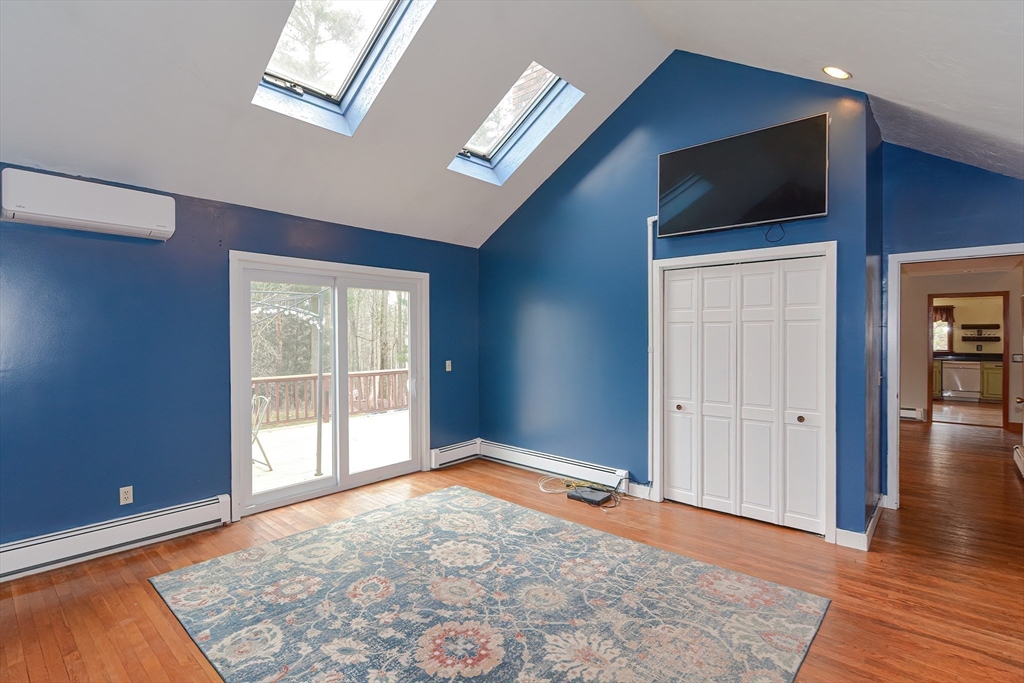72 Allen Road Sturbridge, MA 01566 - Photo 15 of 40 an empty room with wooden floor and windows