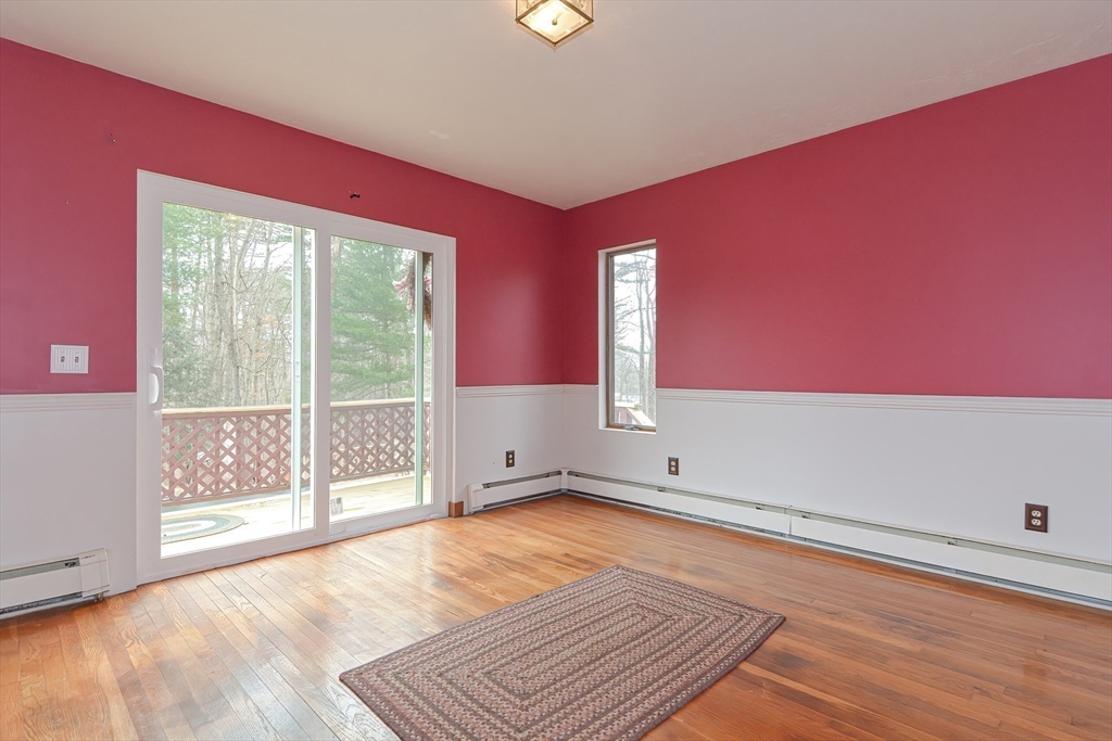 72 Allen Road Sturbridge, MA 01566 - Photo 18 of 40 a view of empty room with wooden floor and fan