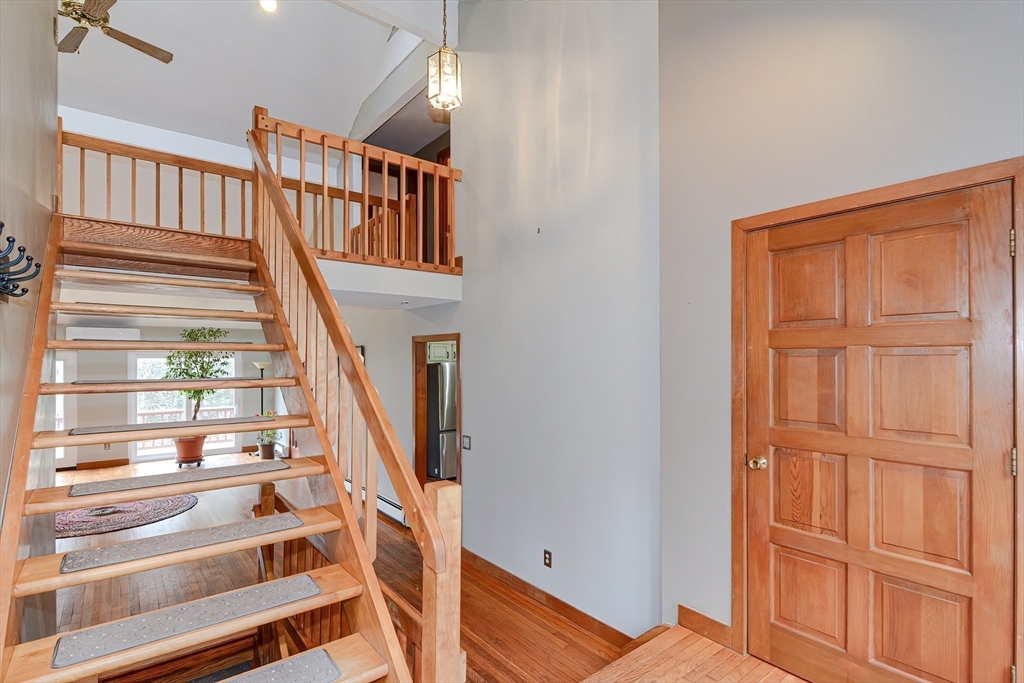 72 Allen Road Sturbridge, MA 01566 - Photo 20 of 40 a view of staircase with white walls and a window