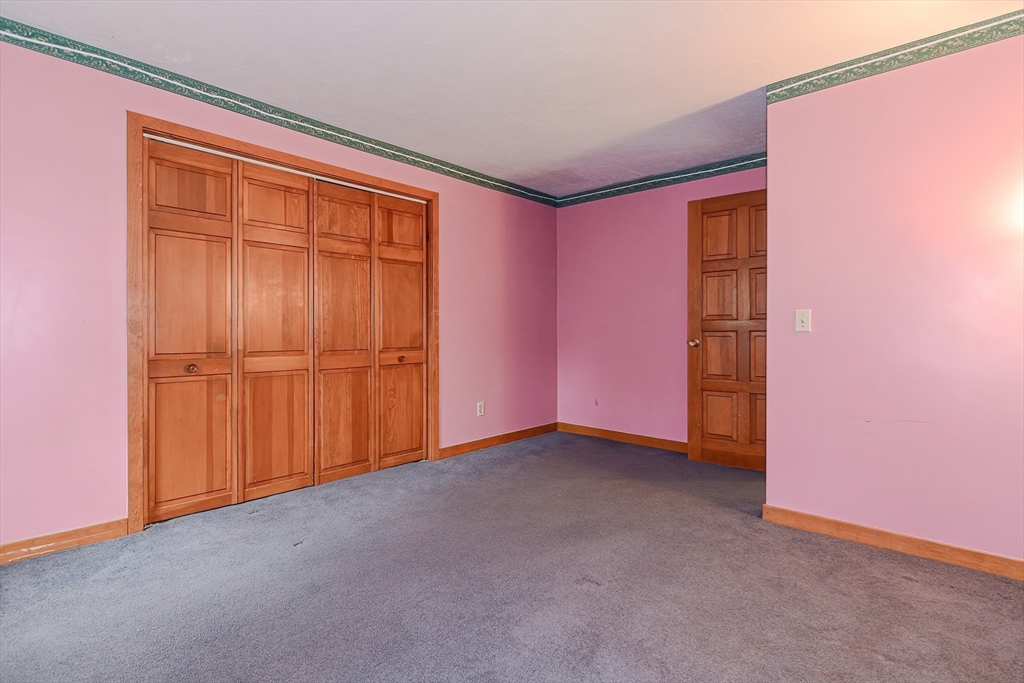 72 Allen Road Sturbridge, MA 01566 - Photo 22 of 40 an empty room with windows