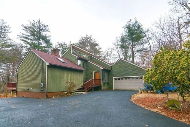 72 Allen Road Sturbridge, MA 01566 - Photo 3 of 40 a house view with a garden space