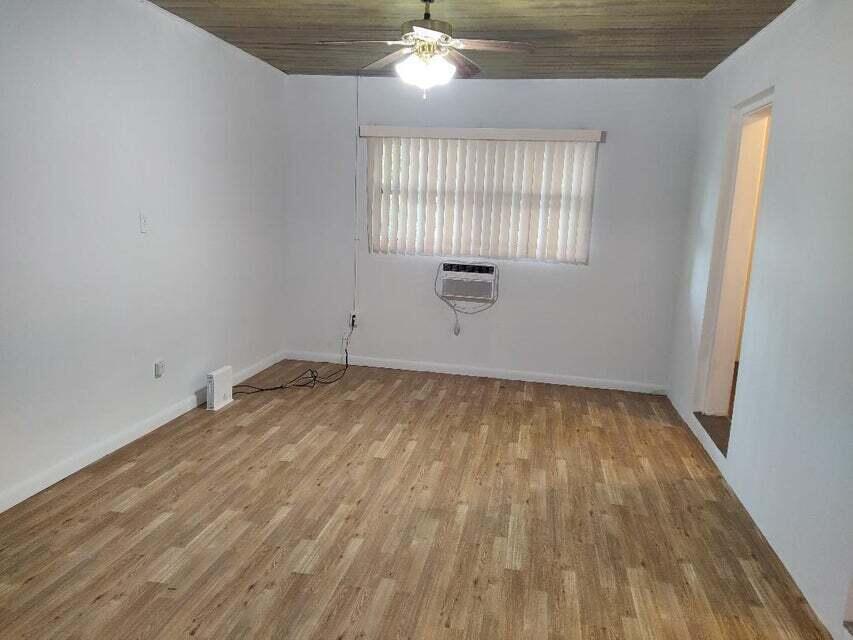 1951 Kathy Lane, Unit B Juno Ridge, FL 33408 - Photo 4 of 10 Living room