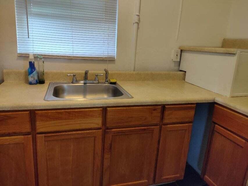 1951 Kathy Lane, Unit B Juno Ridge, FL 33408 - Photo 8 of 10 Kitchen