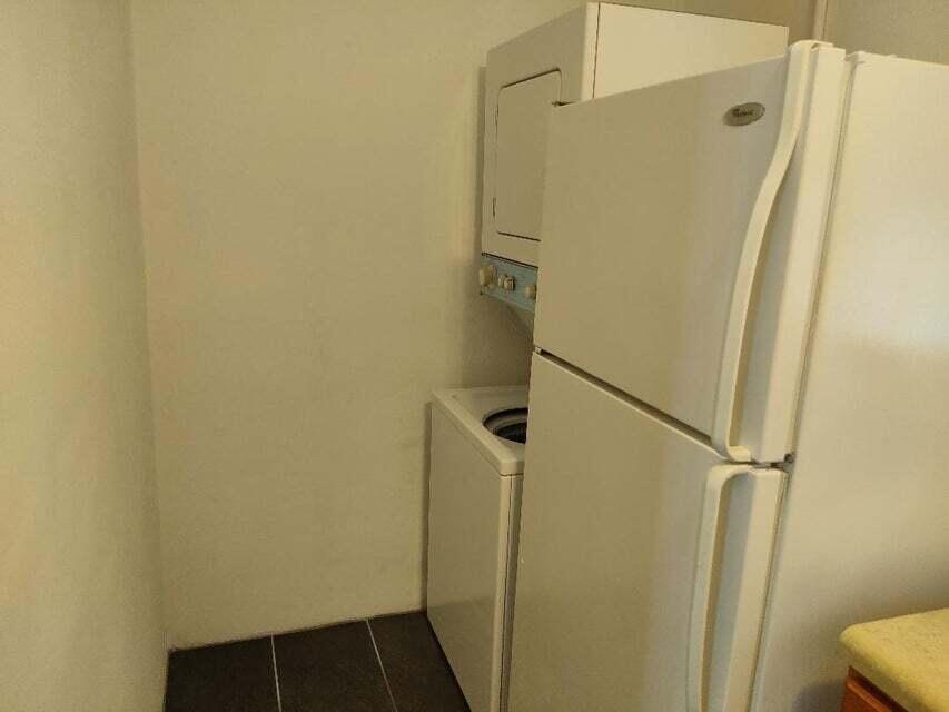 1951 Kathy Lane, Unit B Juno Ridge, FL 33408 - Photo 9 of 10 Washer Dryer in Kitchen