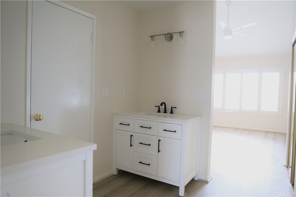 8462 Basin Circle Huntington Beach, CA 92646 - Photo 17 of 29 a view of cabinets and utility room