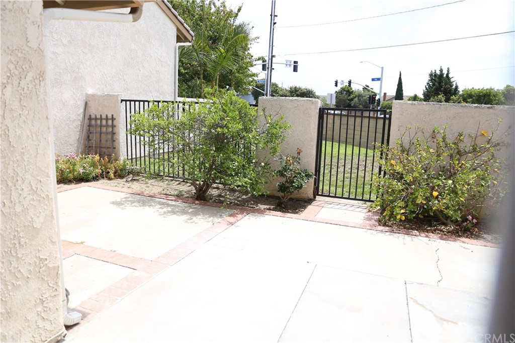 8462 Basin Circle Huntington Beach, CA 92646 - Photo 27 of 29 a view of a garden with a pathway
