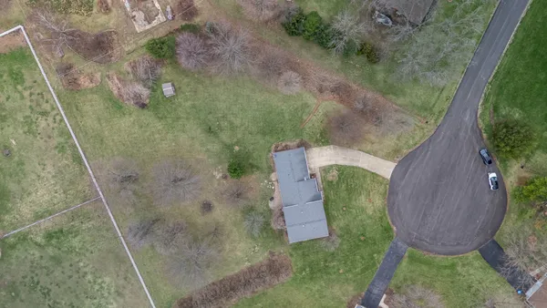 a view of a golf course with a big yard