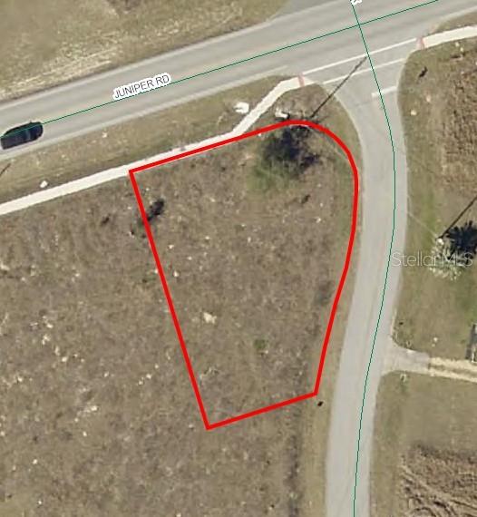 Juniper Loop Circle Ocala, FL 34480 - Photo 1 of 3 a bathroom with a shower and a mirror