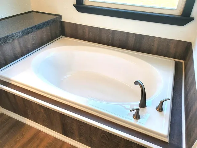 a view of a room with a large window