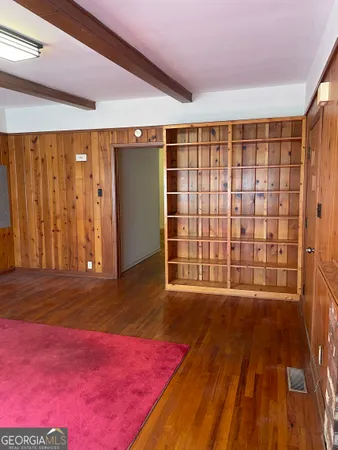 a view of swimming pool with a yard