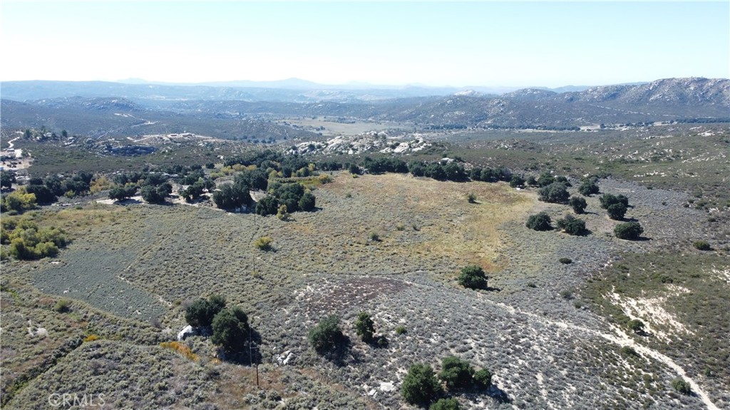 2809 Miller Valley Road Pine Valley, CA 91962 - Photo 2 of 14 a view of a dry field with mountains in the background