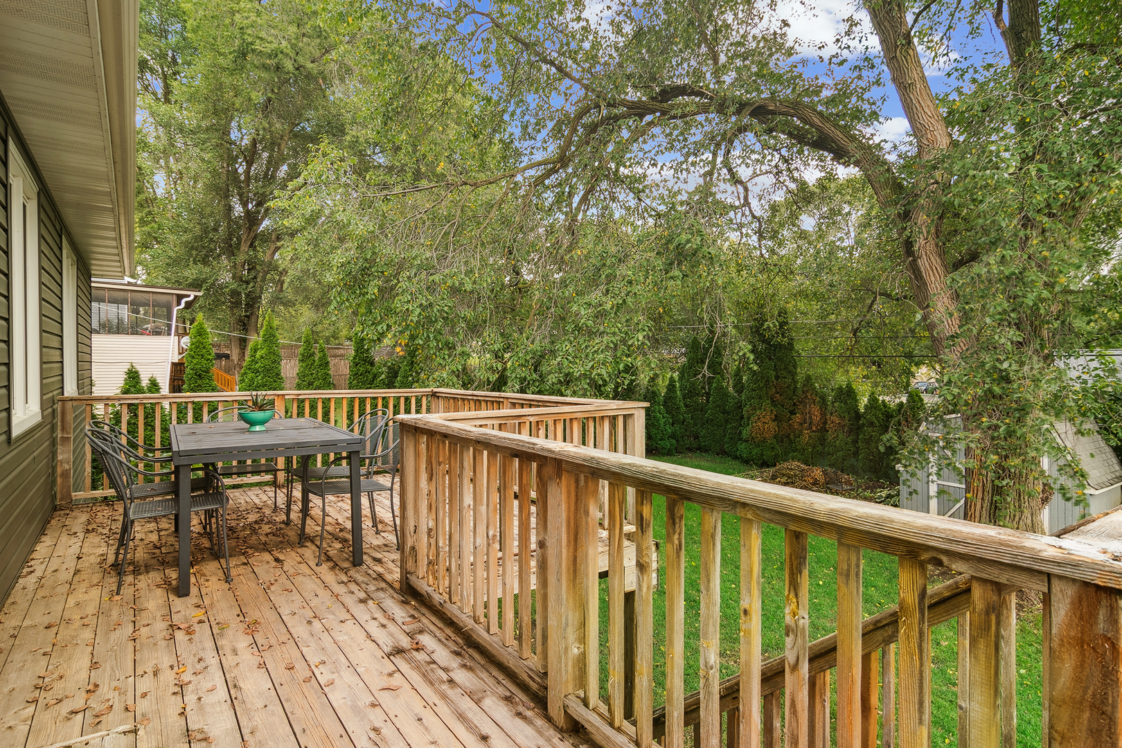 6316 Hilly Way Cary, IL 60013 - Photo 6 of 27 a view of balcony with furniture and trees