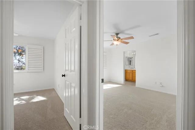 a view of a hallway with closet