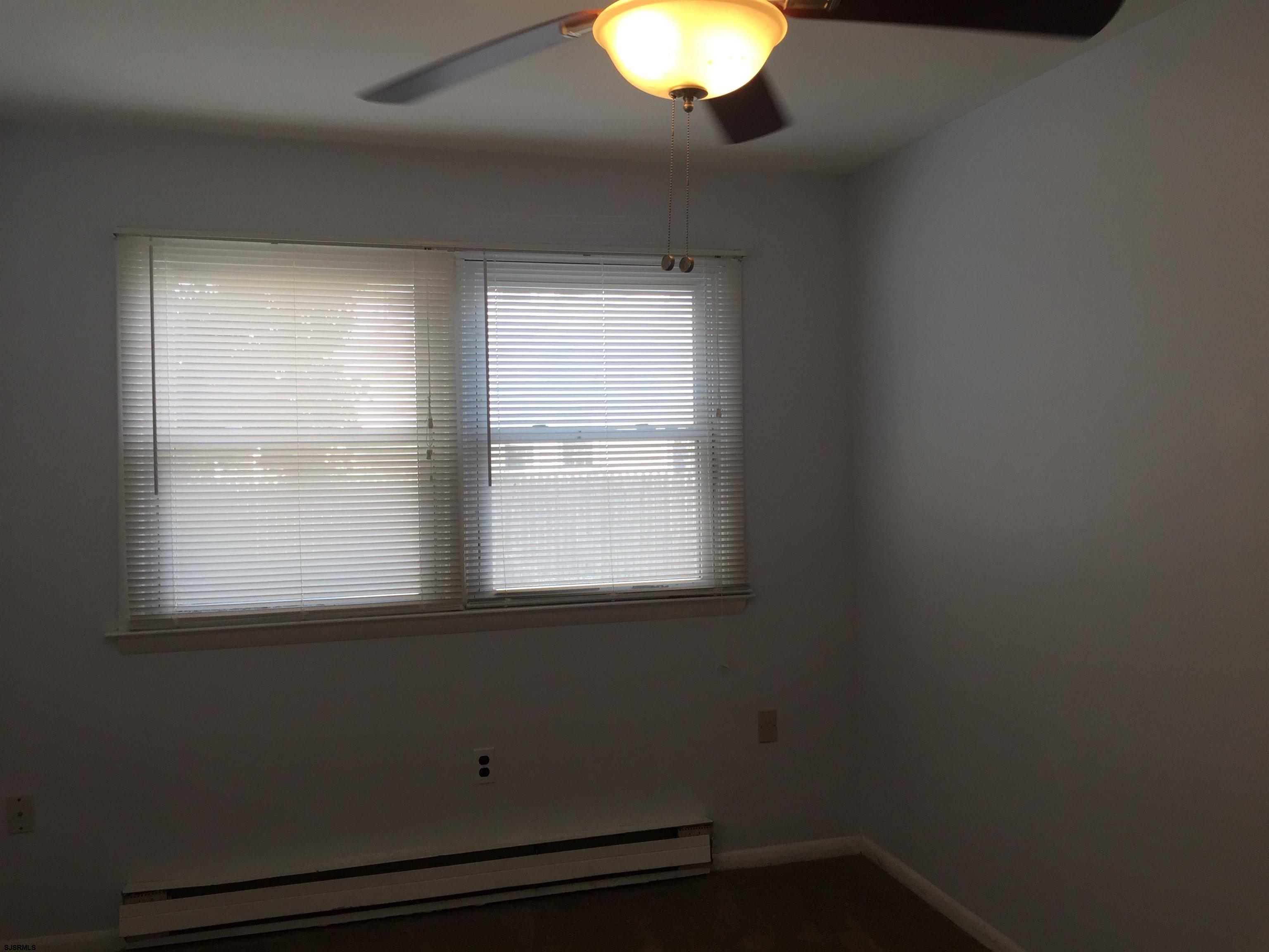 4632 Schooner Road, Unit 1 Brigantine, NJ 08203 - Photo 12 of 16 an empty room with a window