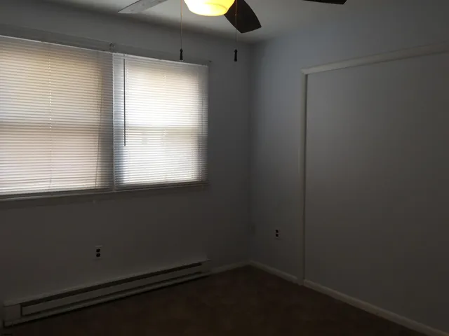 an empty room with windows