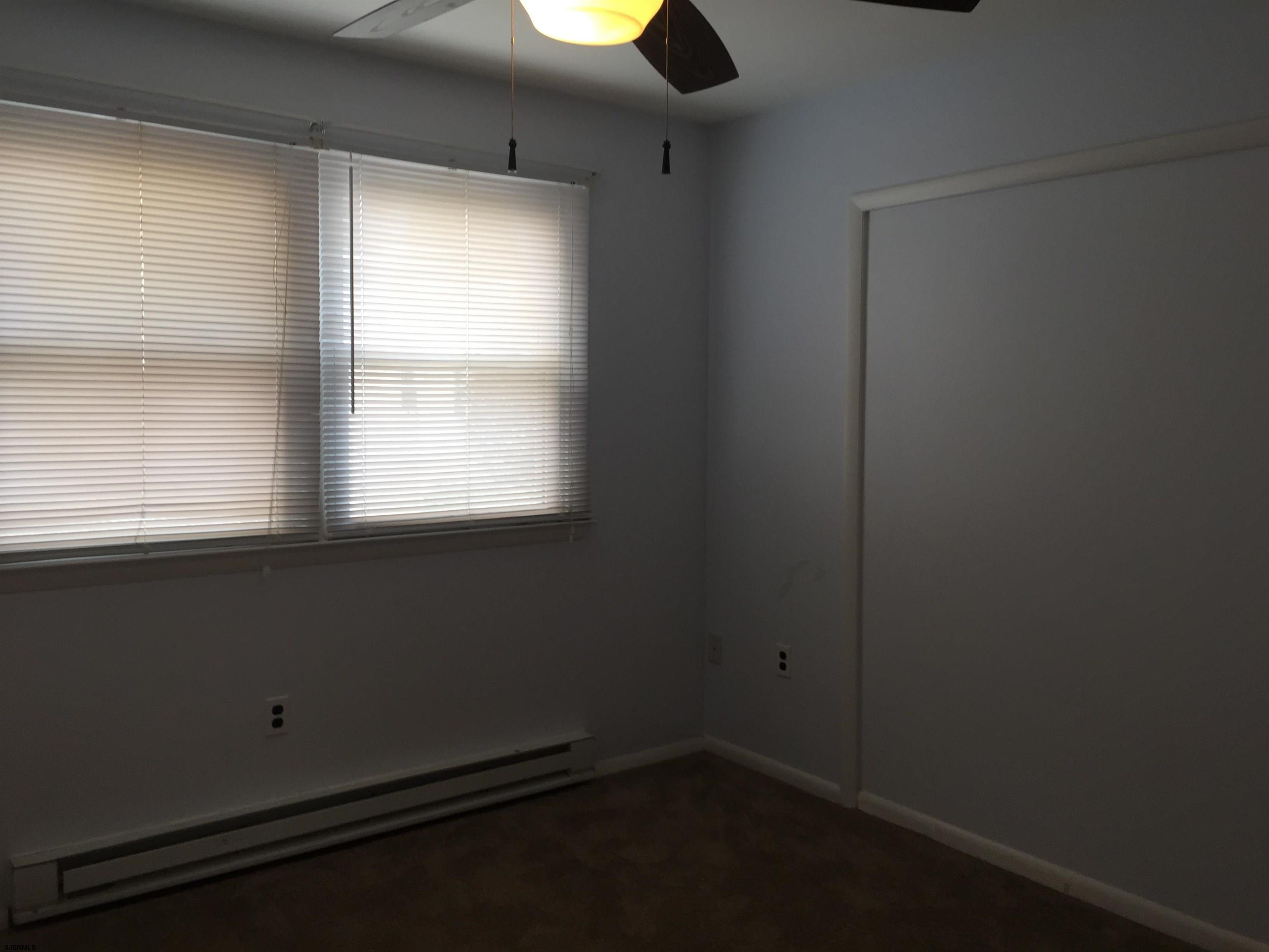 4632 Schooner Road, Unit 1 Brigantine, NJ 08203 - Photo 13 of 16 a view of an empty room with a window