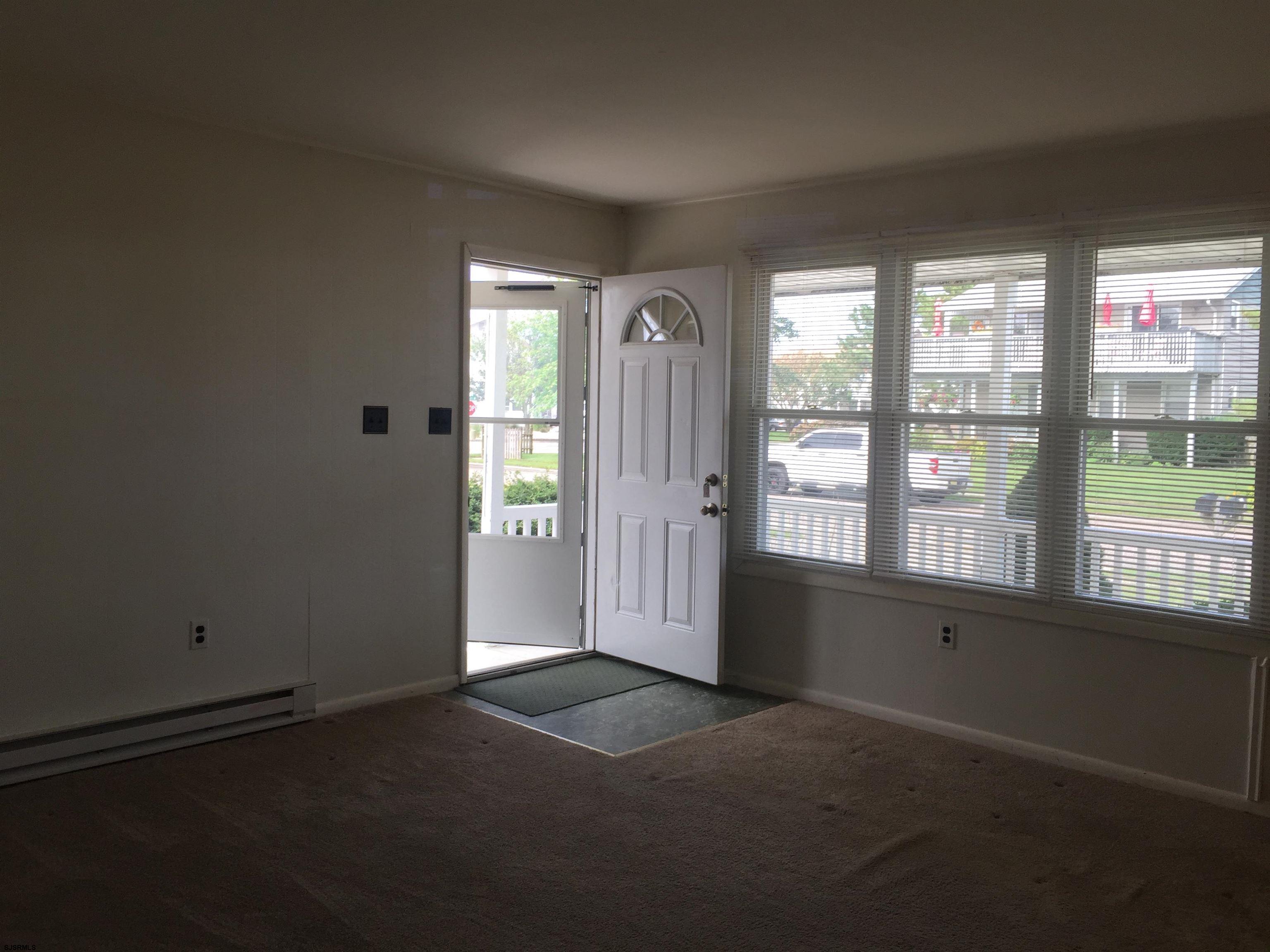 4632 Schooner Road, Unit 1 Brigantine, NJ 08203 - Photo 14 of 16 an empty room with windows