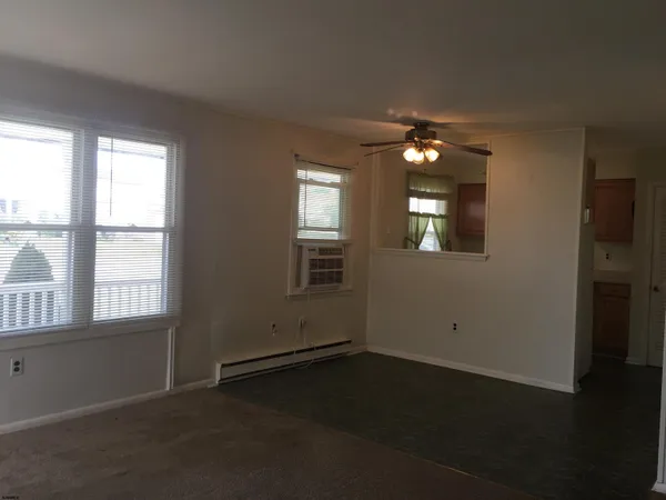 a view of cabinets with wooden floor