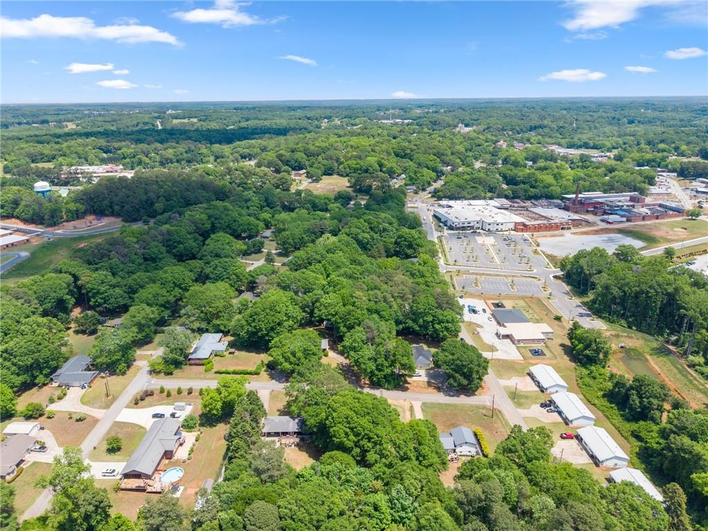 43 Anderson Street Jefferson, GA 30549 - Photo 44 of 45 an aerial view of a city with lots of residential buildings