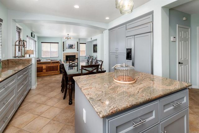 a kitchen with granite countertop granite top and stainless steel appliances