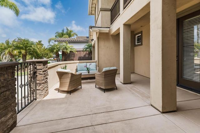 a view of balcony with outdoor seating and plants