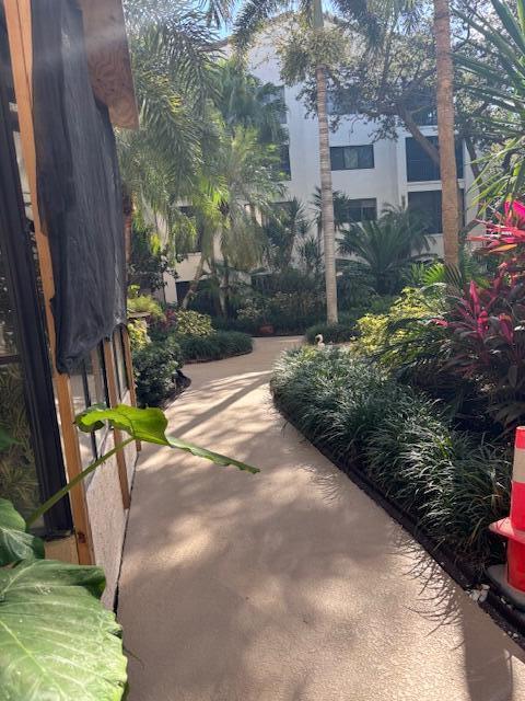 500 Ocean Trail Way, Unit 111 Jupiter, FL 33477 - Photo 19 of 35 a view of a backyard with sitting area