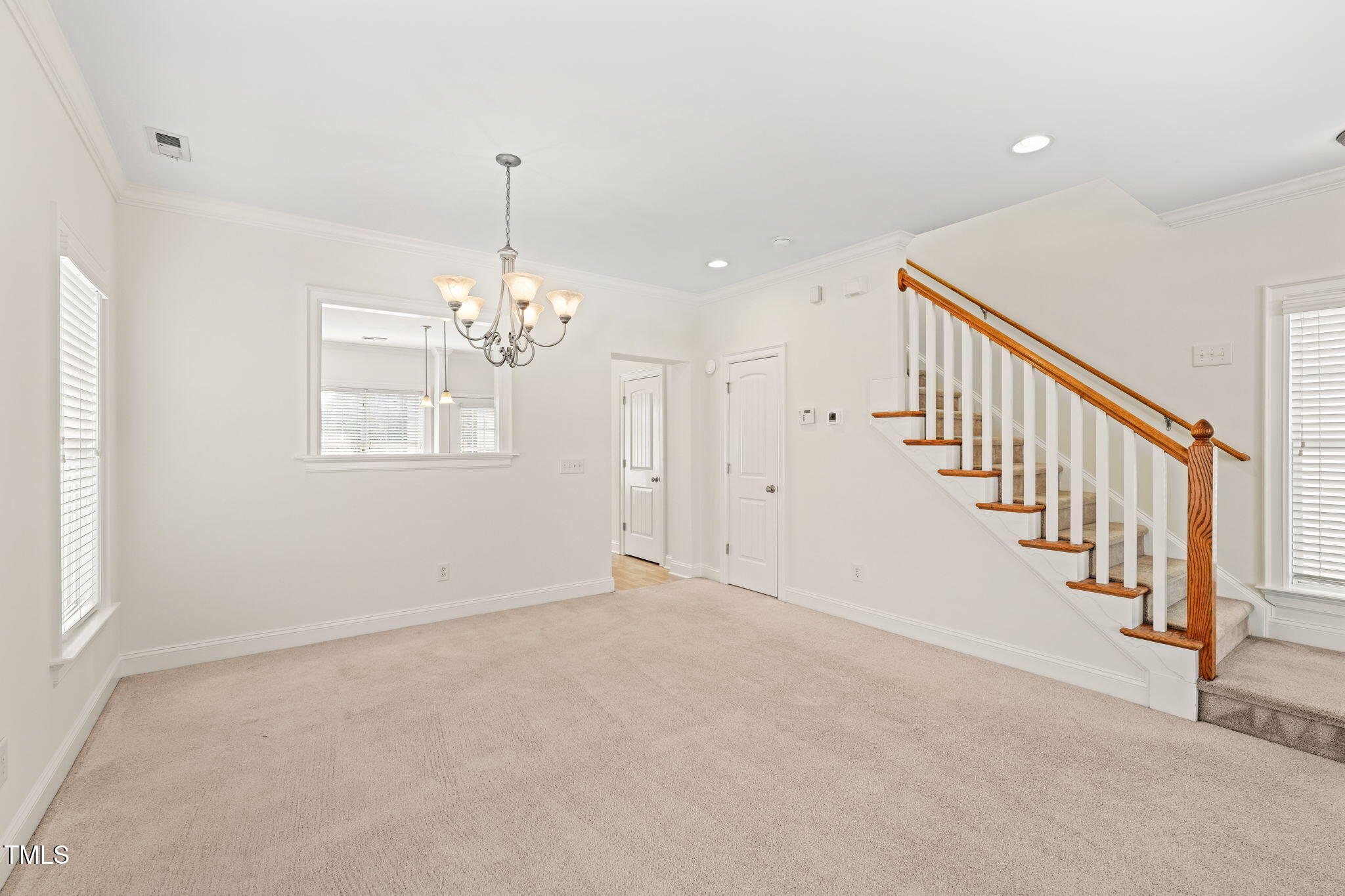 7732 ACC Boulevard Raleigh, NC 27617 - Photo 18 of 32 a view of an empty room with a window