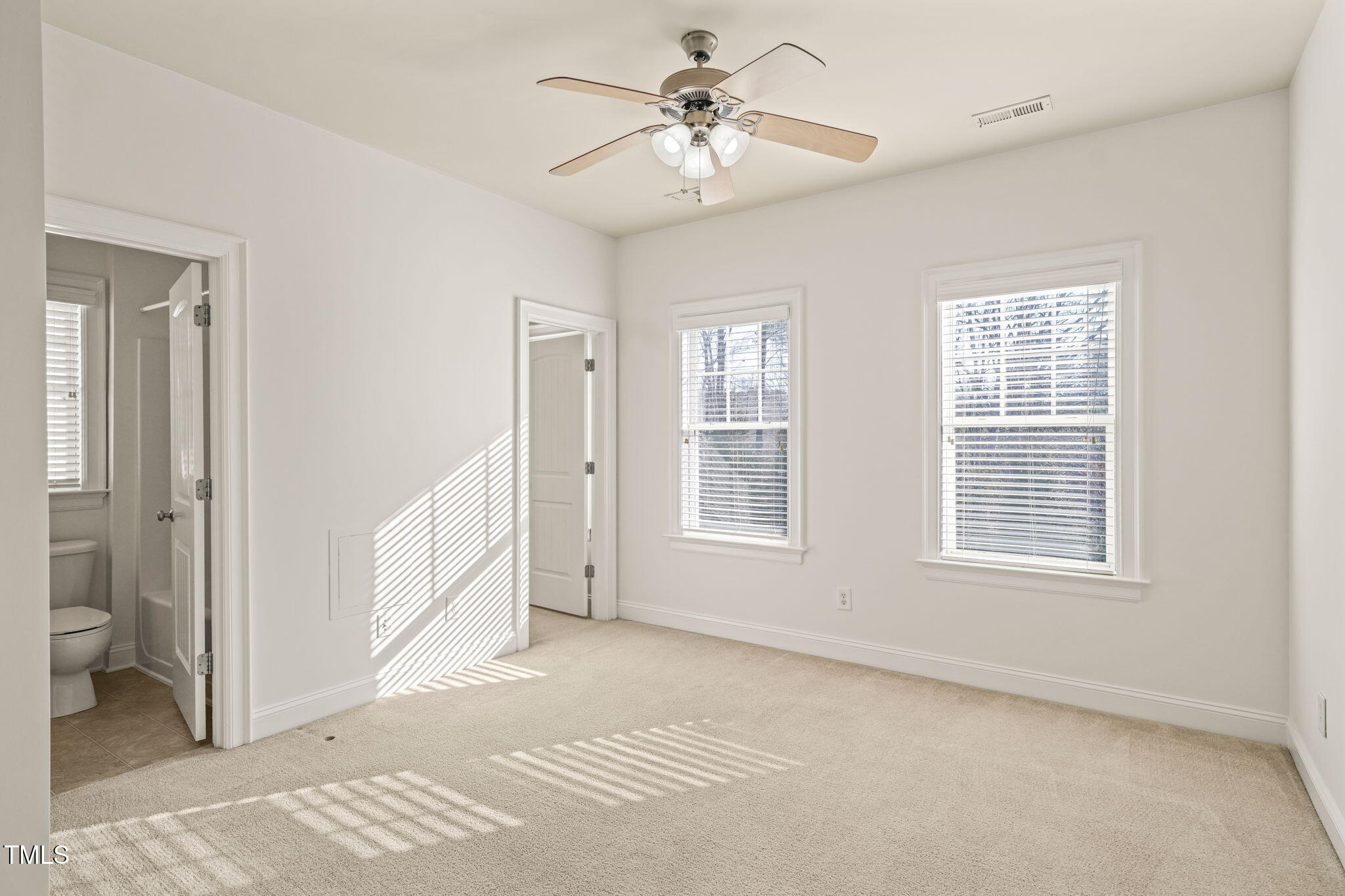 7732 ACC Boulevard Raleigh, NC 27617 - Photo 21 of 32 a view of an empty room with a window