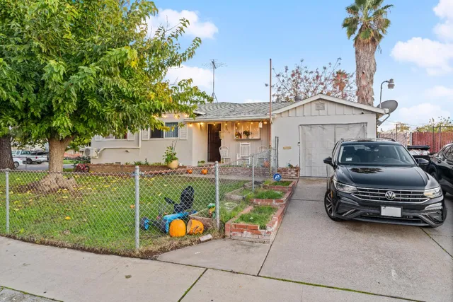 a front view of a house with outdoor area