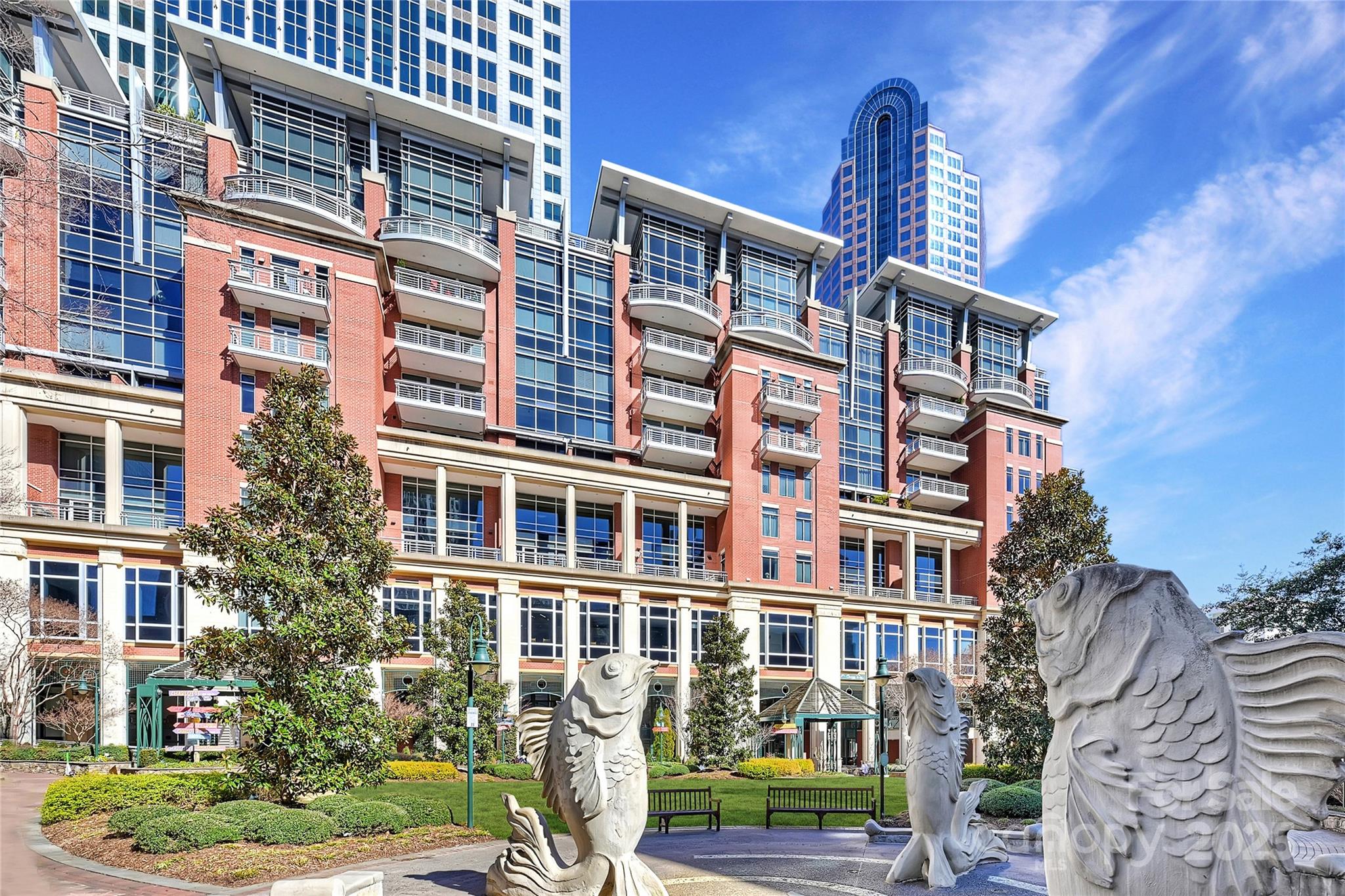 a front view of a building with garden