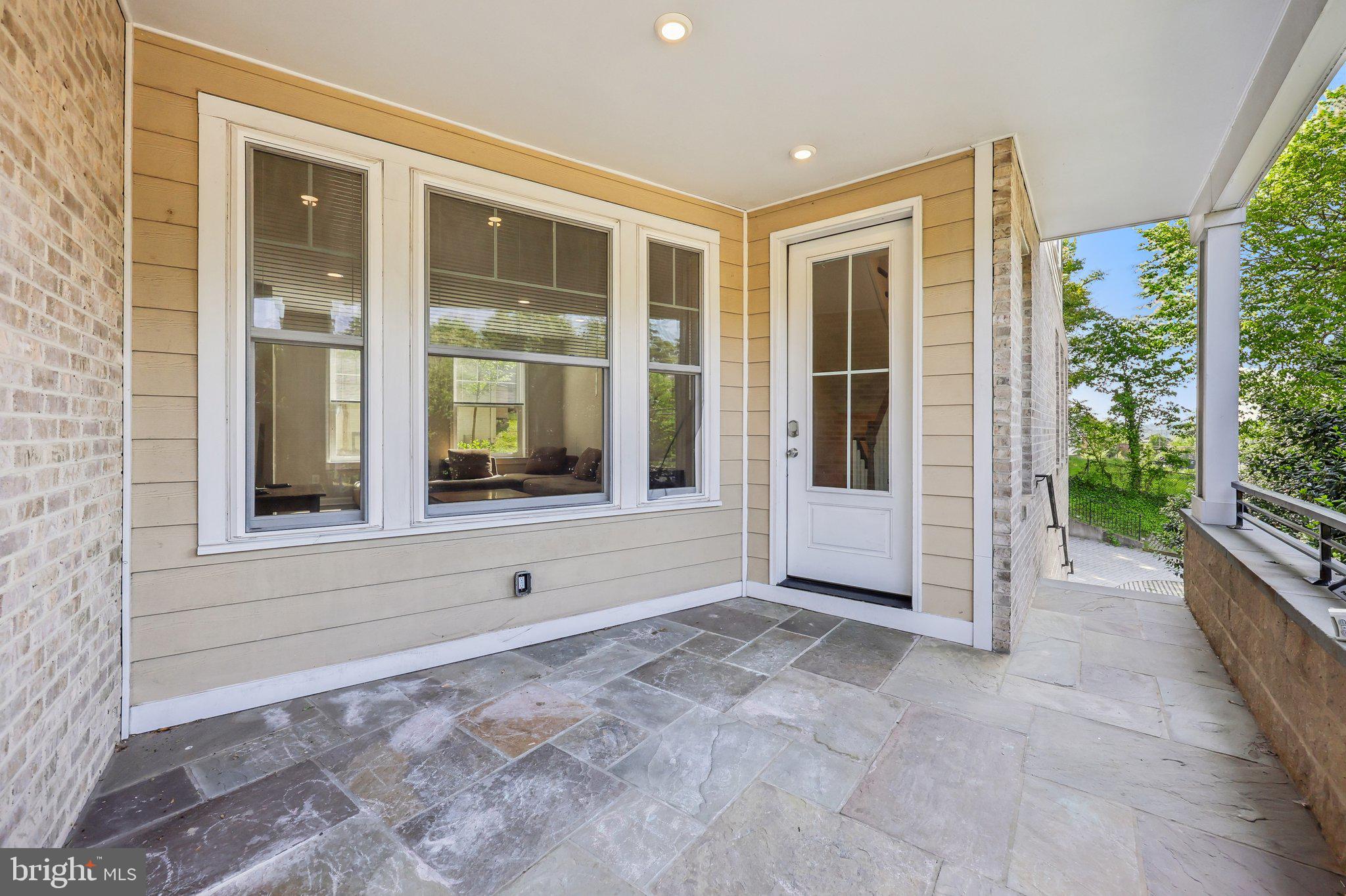 1905 South Glebe Road Arlington, VA 22204 - Photo 4 of 50 a view of an entrance with wooden floor and fence