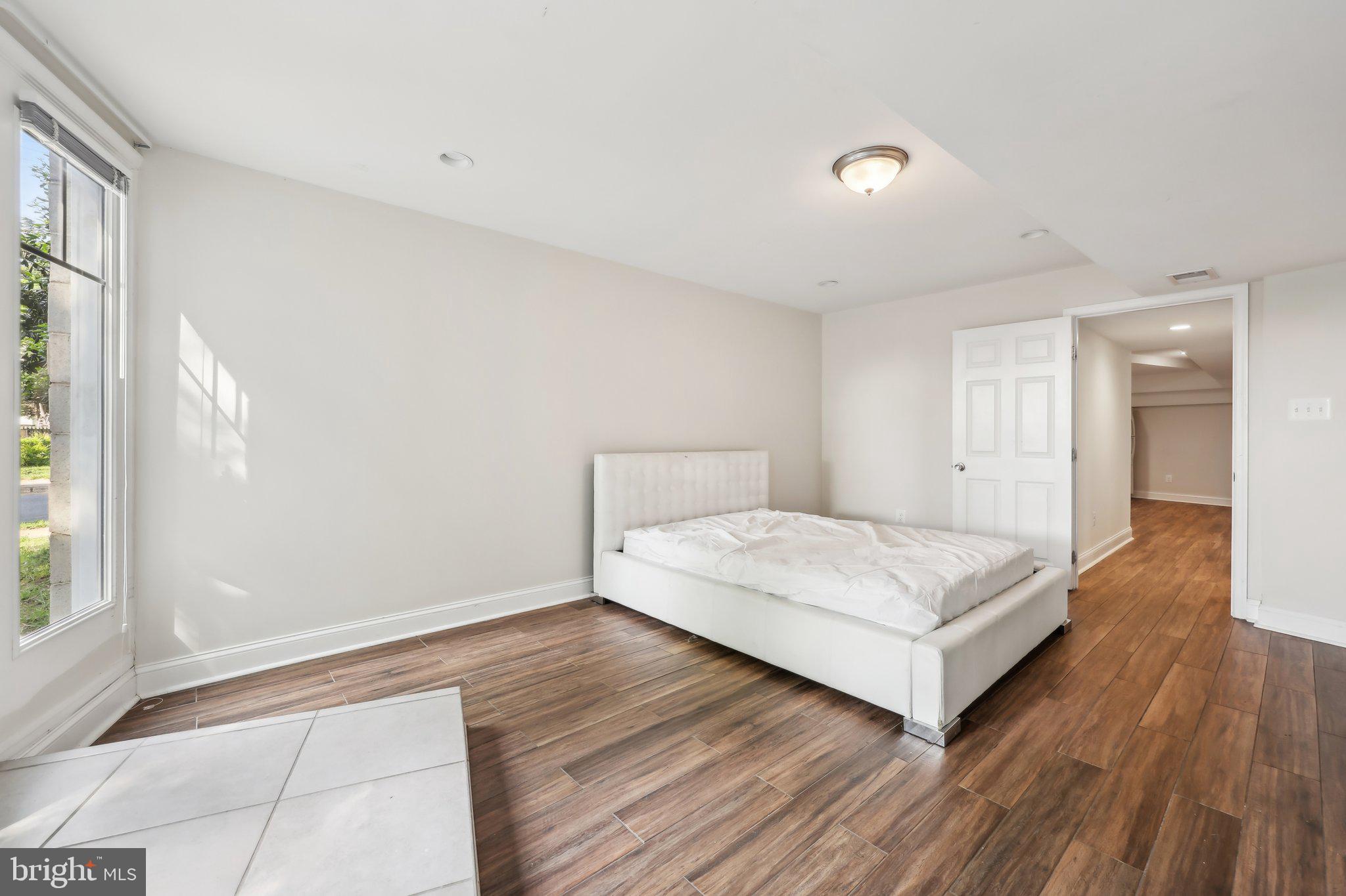 1905 South Glebe Road Arlington, VA 22204 - Photo 41 of 50 a bedroom with a bed and a window