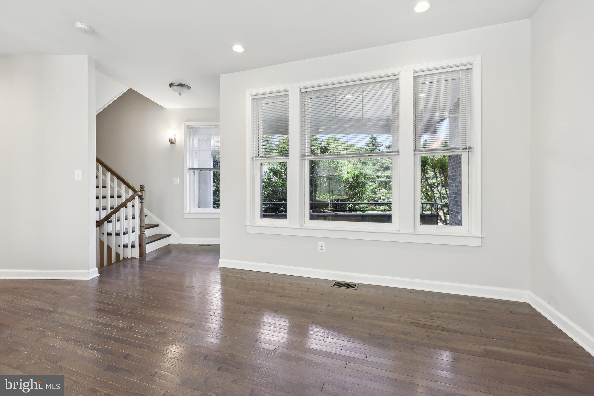 1905 South Glebe Road Arlington, VA 22204 - Photo 5 of 50 wooden floor in an empty room with a window