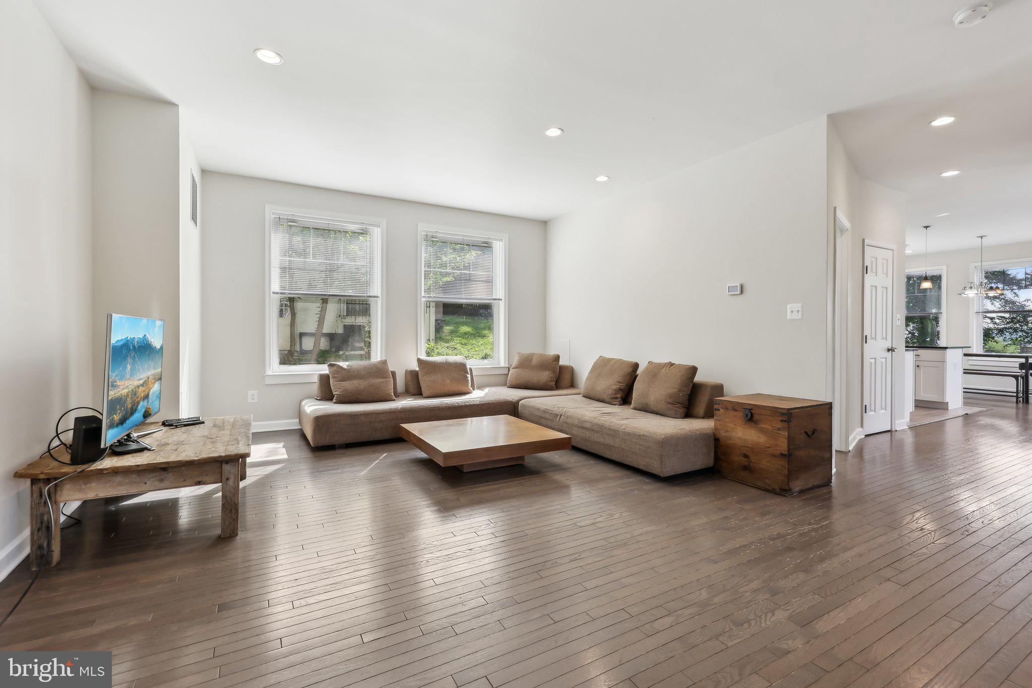 1905 South Glebe Road Arlington, VA 22204 - Photo 8 of 50 a living room with furniture and a wooden floor