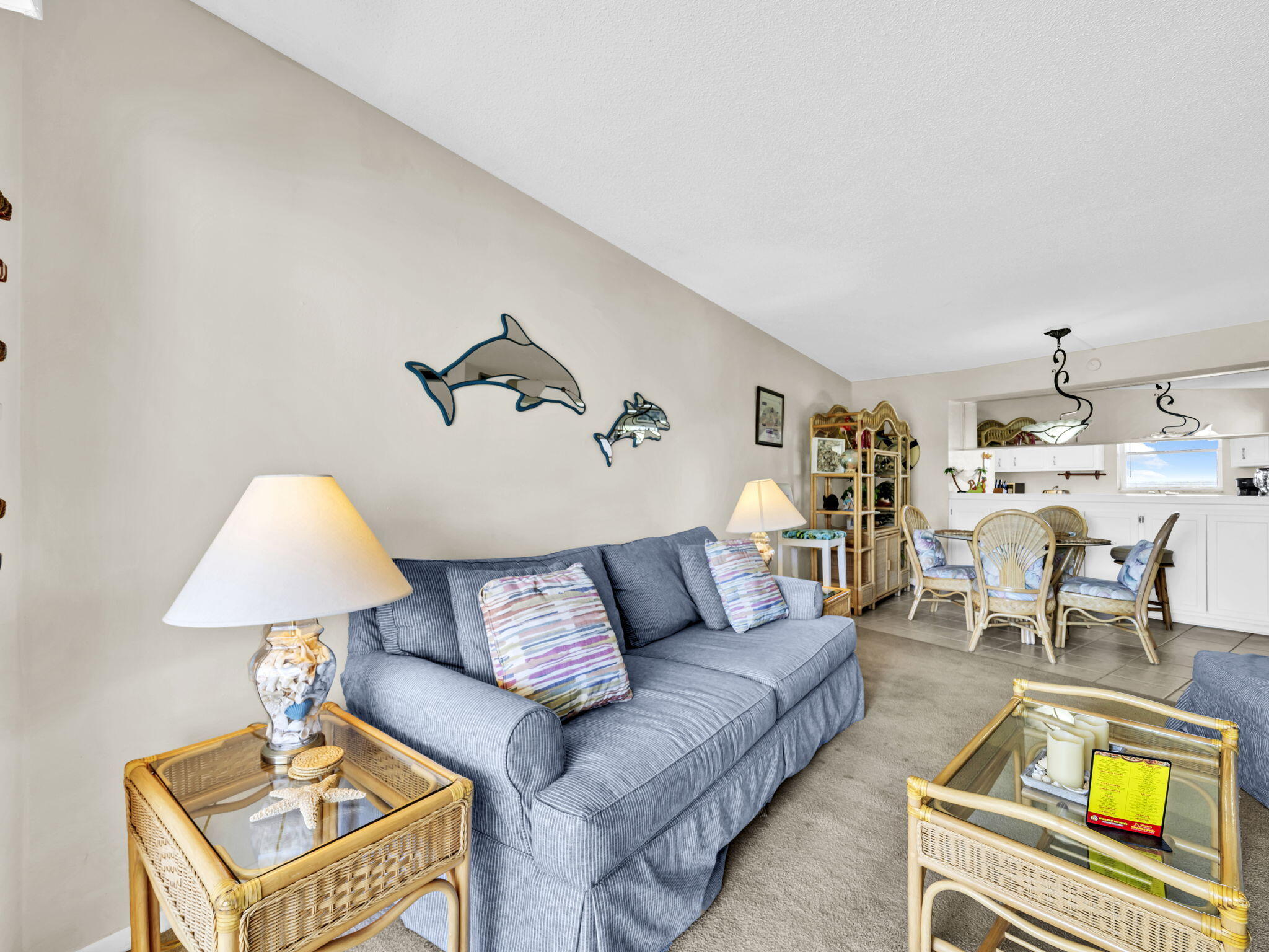 909 Santa Rosa Boulevard, Unit 235 Fort Walton Beach, FL 32548 - Photo 18 of 30 a living room with furniture and a table