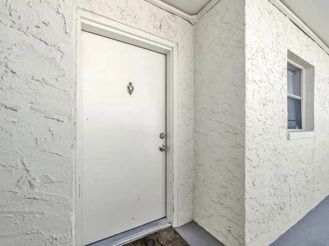 a kitchen with a stove and cabinets