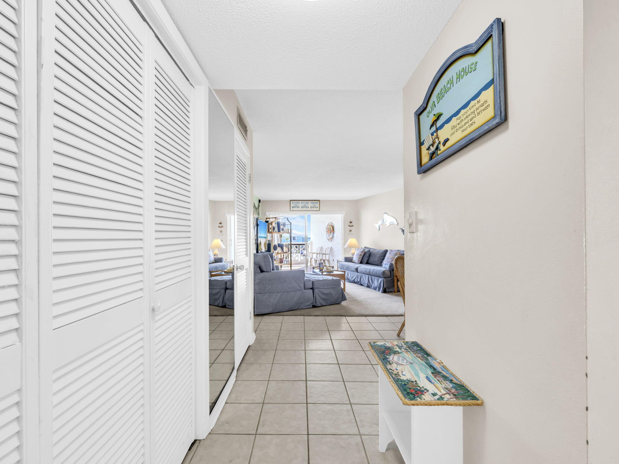 909 Santa Rosa Boulevard, Unit 235 Fort Walton Beach, FL 32548 - Photo 8 of 30 a view of a hallway with a workspace