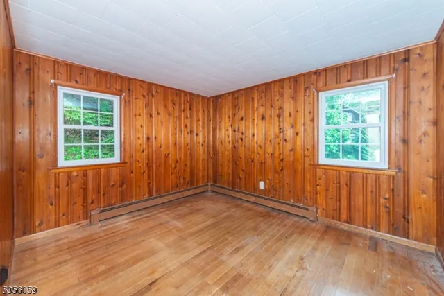 an empty room with windows