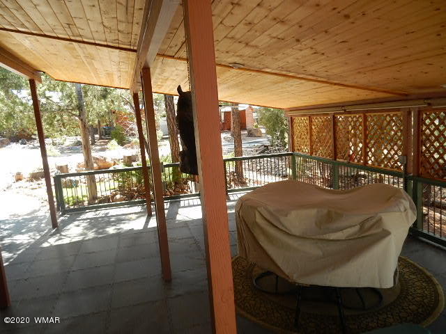 3721 Horseshoe Loop Show Low, AZ 85901 - Photo 12 of 44 a dining table sitting next to a large window