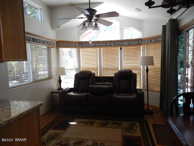 3721 Horseshoe Loop Show Low, AZ 85901 - Photo 18 of 44 a living room with furniture and a window