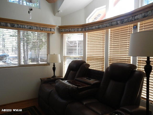 3721 Horseshoe Loop Show Low, AZ 85901 - Photo 35 of 44 a living room with furniture and a window