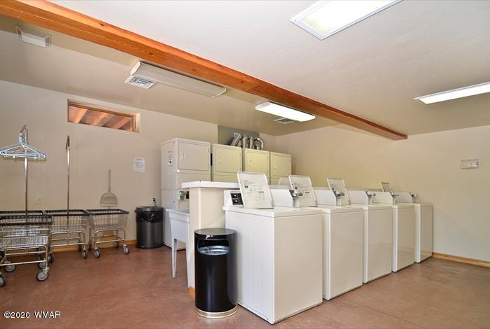 3721 Horseshoe Loop Show Low, AZ 85901 - Photo 42 of 44 a utility room with multiple dryer and washer