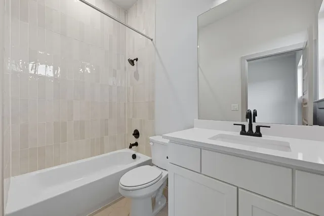 a kitchen with cabinets and window