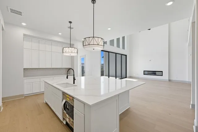a view of a hallway with stairs