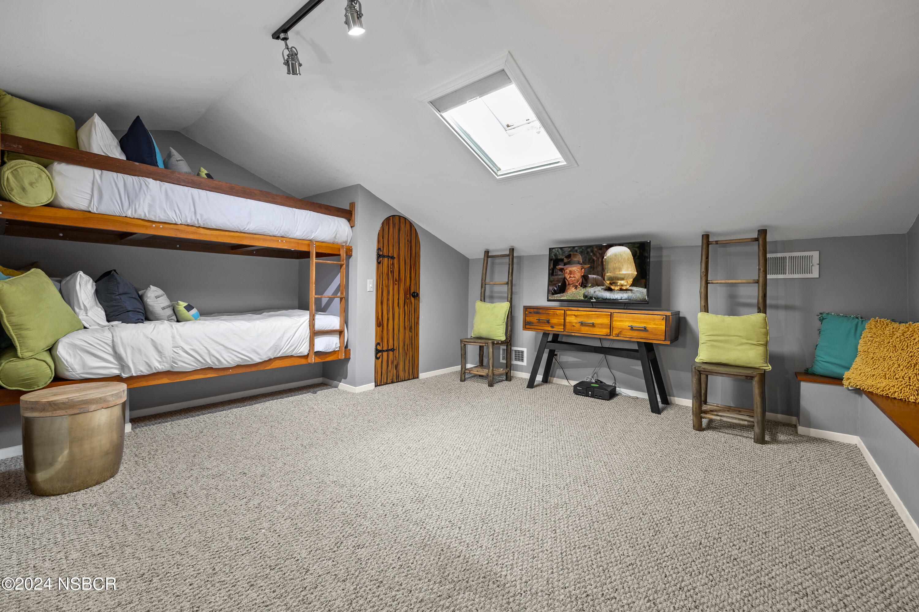 Undisclosed Address Santa Ynez, CA 93460 - Photo 15 of 43 a bedroom with furniture and a lamp