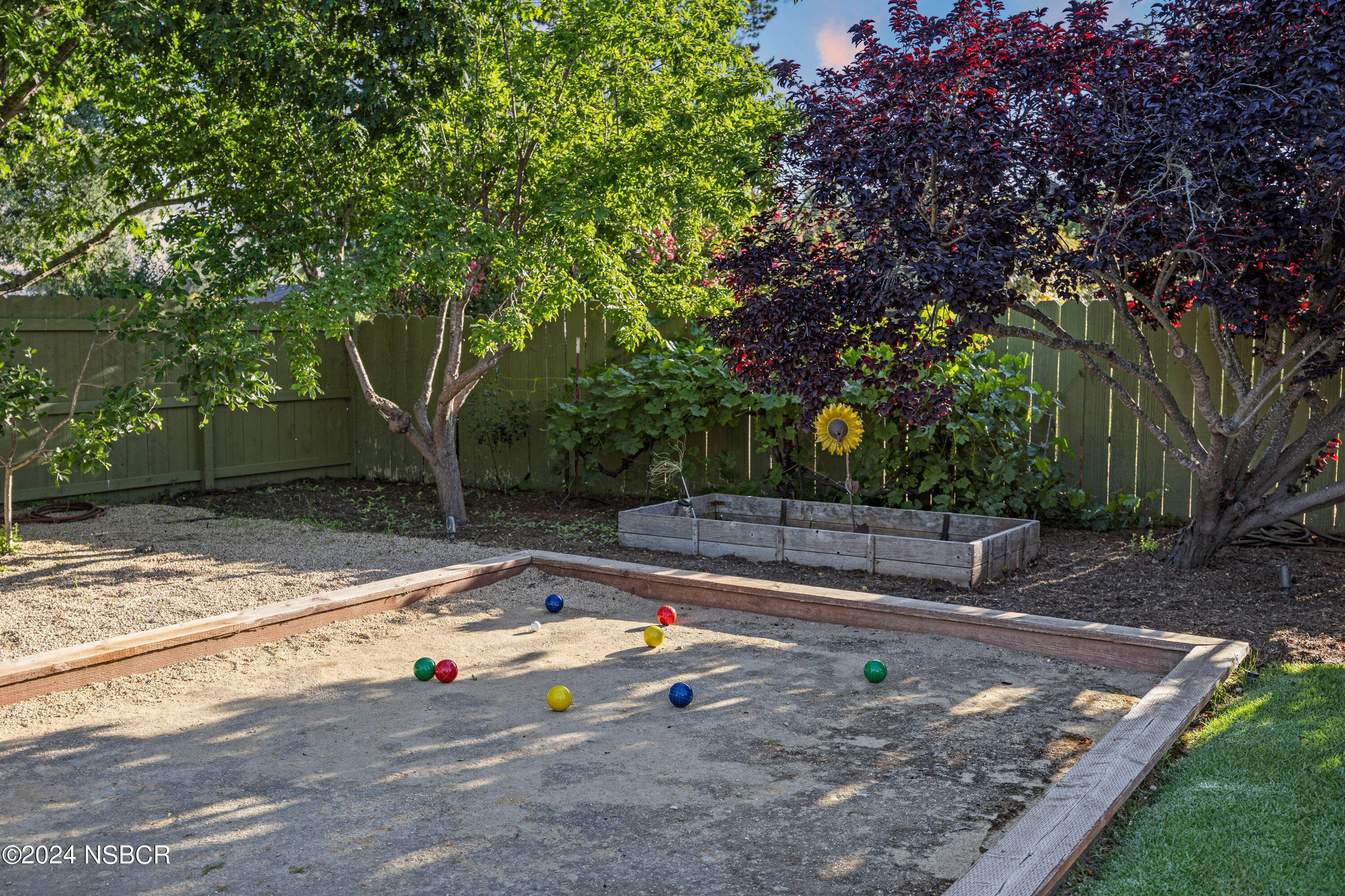 Undisclosed Address Santa Ynez, CA 93460 - Photo 18 of 43 a view of a backyard with large trees