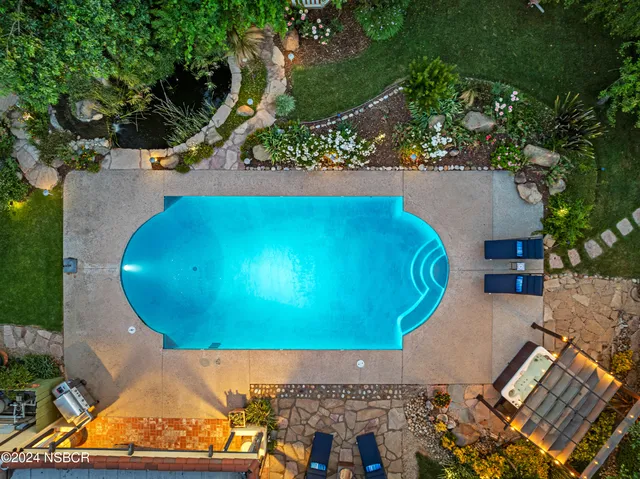 an aerial view of a pool