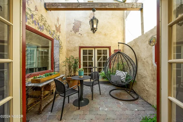 a view of porch with seating area